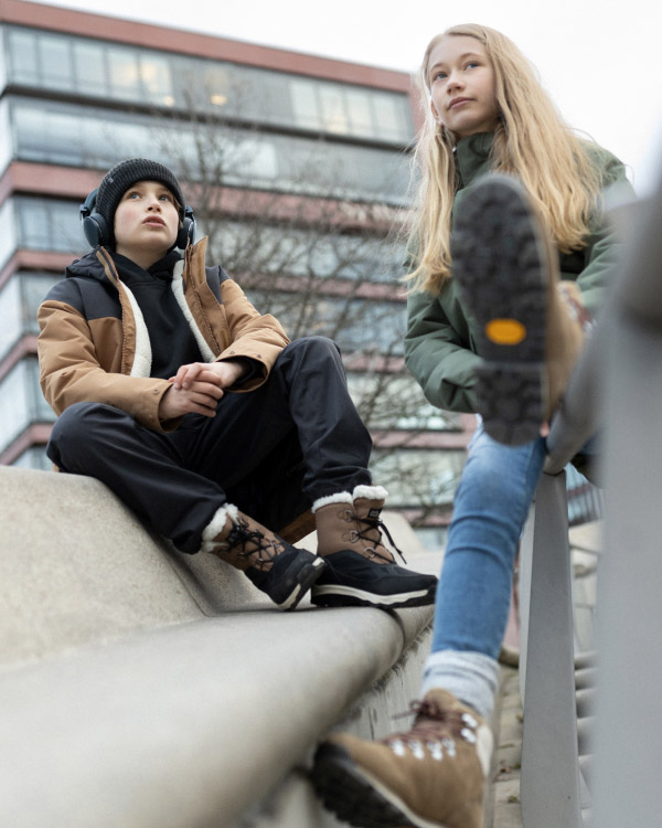Two teenagers hanging out in the city